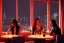 Placeholder: women sitting in a cocktail bar next to a window, outside the window is a city, police station in window view, atmospheric ,night lighting,rainy, realistic, unity engine, cinematic lighting, octane render.