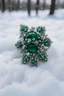Placeholder: A green brooch in the snow