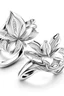 Placeholder: White gold couple rings in the shape of a tiger lily flower containing diamonds