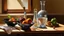 Placeholder: A still life painting depicting various kitchen items including a glass, a ceramic bowl filled with fruits, a bottle, and a rolling pin on a table in a bright setting