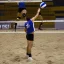 Placeholder: a man spiking a volleyball