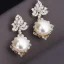 Placeholder: drop diamond and pearl earrings, art noveau, filigree, floral, breathtaking, highly ornate, delicate, intricate, photorealistic, high fashion, fine jewellery, luxury, designer