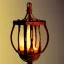 Placeholder: polaroid of swirling fireball inside a wrought iron lantern, luminescent glow, moody, tender, photorealistic, octane render, golden hour