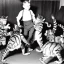 Placeholder: Old photo of monkey with dancing cats