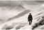 Placeholder: A cowboy traverses a vast expanse of icy mountains during a tumultuous winter storm. The biting winds howl fiercely, whipping snowflakes into a frenzy around him. Clad in weathered leather, he presses forward, his determined stride defying the harsh elements. The mountains stand sentinel-like, their peaks obscured by the tempest's fury, creating an otherworldly, desolate landscape. Photo taken by Victoria Will with a Nikon D850 and a telephoto lens. Award Winning Photography style, Natural light