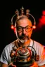 Placeholder: Portrait of a man with a radio helmet on his head. Wearing glasses. A small beard of pepper and salt. He is bald. White. He is a metal fan and. Flames surround him. In the background, a robot gives him a finger of honor.