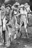 Placeholder: Four Ziegfeld Girls on jeans walking