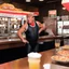 Placeholder: Donald Trump wearing a leotard in a pizzeria
