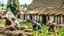 Placeholder: young and old people working in the field near medieval barns