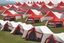 Placeholder: red tents in a plain