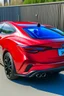 Placeholder: ein mazda 3 2017 von hinten mit 6 auspruffrohren