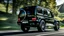 Placeholder: A sleek ((( Mercedes-AMG G 63 BMW))) with a majesticly curved rear, cutting through a (sunny, open countryside) backdrop