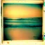 Placeholder: Photographic, Sea, soft turquoise waves, polaroid with damaged border, 1968, sunset, scotch tape on the border, scribblings, Coffee stain