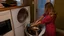 Placeholder: woman puts spoons in her dryer