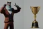 Placeholder: minimalistic trophy design for animation film festival character with creative trophy with his hand like winner