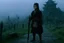 Placeholder: [screenshot under the moon of Pan's Labyrinth (2006) by Kevin Eastman and Peter Laird] this Nomadic Japanese woman stands at the border of the medieval town with her katana (Retrofuturism: Where Yesterday’s Tomorrow Still Shines on the foggy battlefield) ready to kill with no inhibitions