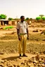 Placeholder: Sudan, destroyed city, one man standing