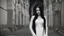 Placeholder: A beautiful white woman standing side and have Long soft black hair And wearing a gothic dress.