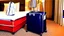 Placeholder: hotel housekeeping steals someone's suitcase