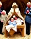 Placeholder: Prince Charles and Camilla in a nativity scene