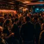 Placeholder: a crowded bar at night, lots of people, focus on a lonely person against the wall