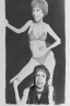 Placeholder: Carol Burnett bobblehead doll in an undersized bikini breaking the space-time continuum photorealistic silver ink drawing on gold paper