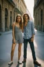 Placeholder: A realistic photo of a Milano in late spring, a pair of inamorato young people on the street, early evening, last shines of sun. Photo taken by Mamiya M645 camera with low-speed film, highly detailed, wide lens