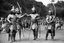 Placeholder: [very impressive high res masterpiece in Kodak Eastman 5247, scene by László Krasznahorkai] As Arjuna and Duryodhana stand shoulder to shoulder, facing the same wooden target in the archery contest, their skills as archers are undeniable. Both warriors possess remarkable talent and prowess with the bow, each capable of hitting their mark with precision and power. Arjuna's form is impeccable, his arrows flying true and striking the target with effortless grace. His mastery of archery shines brigh