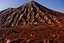 Placeholder: a grand chocolate mountain very melting a hot, suny day