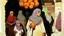 Placeholder: A full-length Palestinian girl wearing an embroidered dress and a white embroidered shawl buys oranges from an old seller wearing a keffiyeh in the market of Jerusalem, 100 years ago, at night with multi-colored lights reflecting on her.