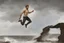 Placeholder: man jumping from the cliff by phil hale