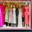 Placeholder: A shop window with women's fashion all bright and delicate colors