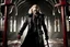 Placeholder: Action shot of Tom Hiddleston as Alucard from the live action "Hellsing" movie based on the anime of the same name. The scene is the dungeon from the first episode of the anime, and he is licking blood from the floor.