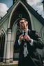 Placeholder: man dressed in church dress clothes ripping open his dress shirt in front of a church