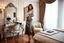 Placeholder: very beautiful sexy lady with beautful silver black midi skirt and blouse standing in a luxury bedroom with high heels next to makeup desk looking to camera