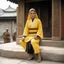 Placeholder: [very impressive high res masterpiece in Kodak Eastman 5247, bokeh scene by Stanley Kubrick] Elizabeth Montgomery in Shaolin gangsta nun covered by tattoos waiting outside in yellow kimono, on a stone doorstep, she menaces the camera with her two fists with tattooed knuckles