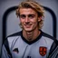 Placeholder: 85mm DSLR color photography of a very detailed headshot fitting all of head and hair in frame. 22-year-old Germen soccer player, with blonde hair color and no facial hair and with a small smile, grey background