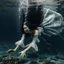 Placeholder: captivating and surreal underwater scene featuring a woman dressed in an elegant royal gown. Her long dark hair stands freely on end suspended in the water, and she is seen diving desperately her lips pursed as air bubbles furiously pour from her mouth rising to the surface. She reaches down towards a small, austere crown lying tantalizingly out of reach on the sea floor, surrounded by eerie bones covered by silt. The dramatic matte oil painting visuals evoke a macabre atmosphere, capturing the