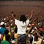 Placeholder: A vibrant and energetic concert performance by Lucky Dube, with a large crowd of enthusiastic fans dancing and singing along to his reggae music.spirit.energy and beauty of this moment.