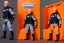 Placeholder: Mike Pence G.I. Joe action figure Doll Space force uniform inside blister packaging hanging on a Wallrack in toy store, fluorescent orange, wide angle shot whole body, black boots, fullsize