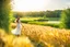 Placeholder: wide angle shot of golden wheat field next to river ,a watermill on river, a beautiful girl in pretty long dress walking in