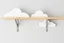 Placeholder: shelf brackets shaped like clouds
