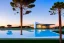 Placeholder: Sunset algarve in quinta do lago, one straight line building of 250 meters long modern luxury architecture with pool on rooftop, with green roofs and sun loungers next to pool, overlooking a tennis sport facility surrounded by pine trees, on a slope with pinus pinea, a wrap around road for low speed cars