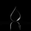 Placeholder: A drop of tears, on a black background