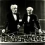 Placeholder: Arturo Toscanini and Leonard Bernstein as the super colliding super conductors.