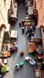 Placeholder: a top view of a public market in Morocco showing people sailing food and outlet requirements