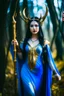 Placeholder: A picture of a beautiful blue faced Korean goddess with skin painted blue, blue body, blue torso, wild black hair, stag antlers, elven ears, golden skirt, holding a staff in a sunny forrest