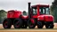 Placeholder: side of a tractor(red) with black wheels and closed cab
