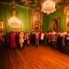 Placeholder: Celebration in a schloss, austrian people, ledherhosen, Austrian aesthetic, warm colors, wooden floor, forest green walls, night time, 8k, HD, cinematography, photorealistic, Cinematic, Color Grading, Ultra-Wide Angle, Depth of Field, hyper-detailed, beautifully color-coded, insane details, intricate details, beautifully color graded, Cinematic, Color Grading, Editorial Photography, Depth of Field, DOF, White Balance, 32k, Super-Resolution, Megapixel, ProPhoto RGB, VR