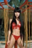 Placeholder: full color Portrait of 18-year-old Lenna Nimoy, with long, straight black hair, the bangs cut straight across the forehead, with a stacked body wearing a red leather string bikini - well-lit, UHD, 1080p, professional quality, 35mm photograph by Scott Kendall